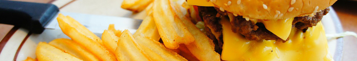 Eating Burger Fast Food at Roy Rogers restaurant in Rockville, MD.